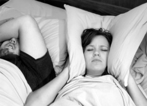 picture of man snoring in bed