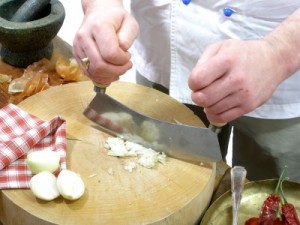 picture of chef chopping onions
