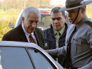 picture of jerry sandusky getting arrested