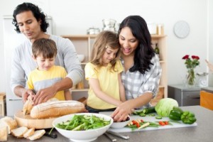 picture of family preparing healthy meal together