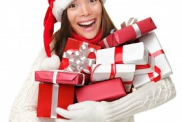 woman with christmas gifts picture of woman with christmas gifts