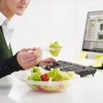 picture of woman eating salad