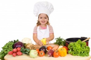 picture of little girl with fruits and vegetables