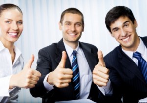 picture of Happy smiling successful gesturing businesspeople at office. Focus on hands.