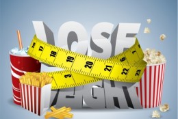 Lose weight text with measure tape and junk food picture of Lose weight text with measure tape and junk food